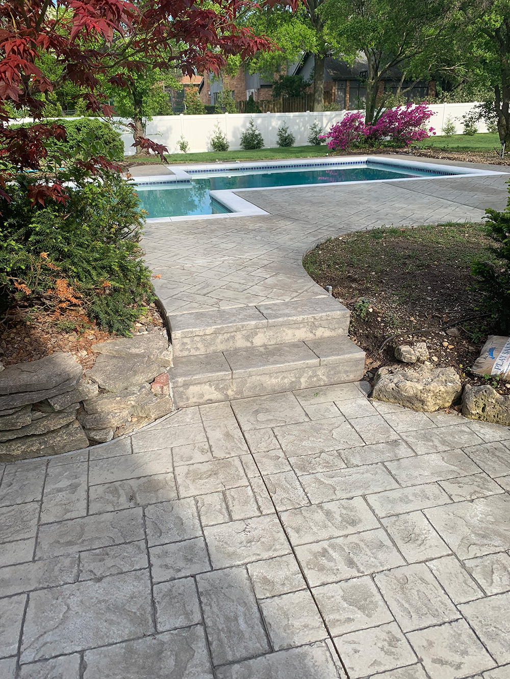 stamped concrete pool edge